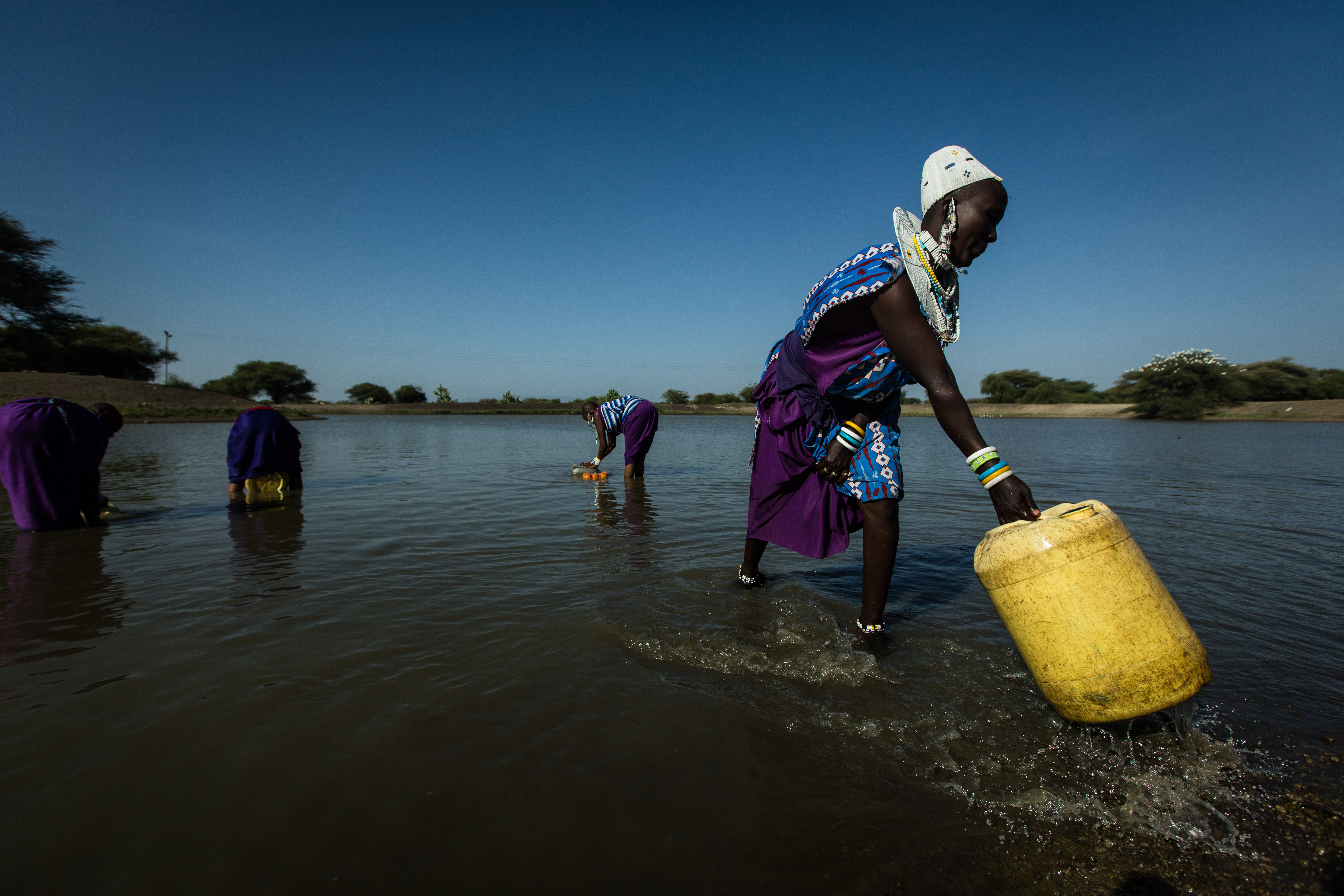 women gathering water